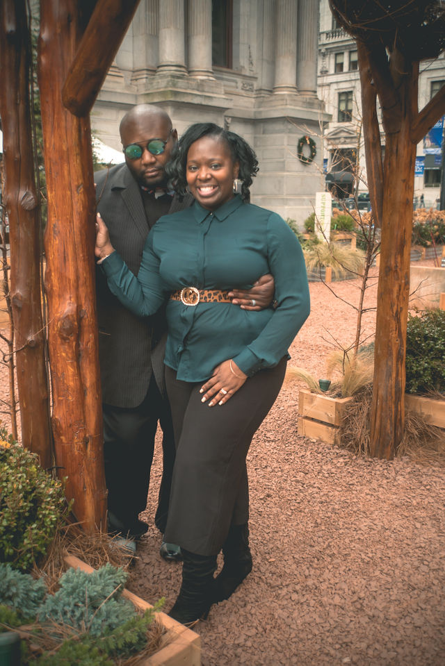A couple sharing a smile in a garden