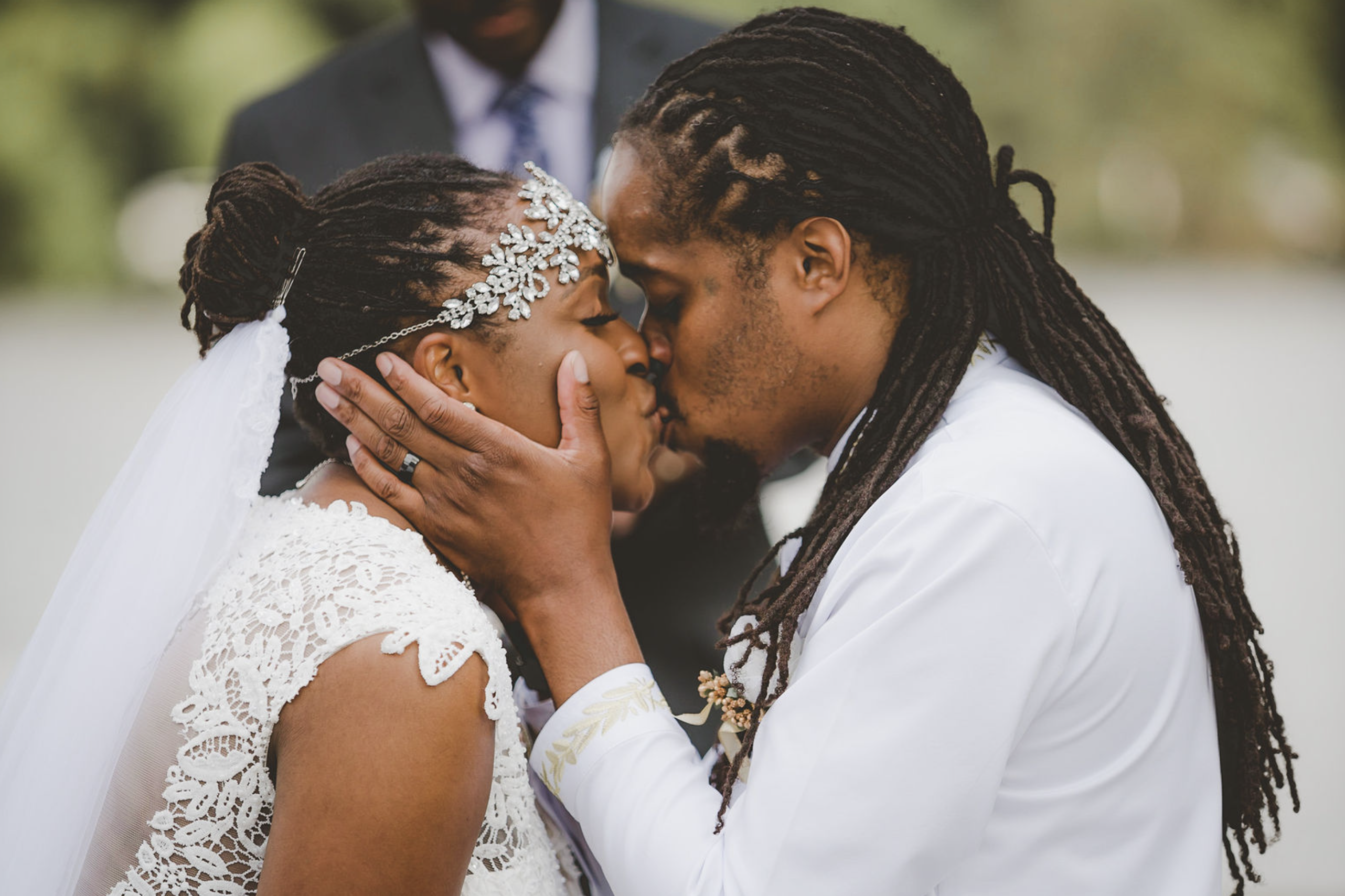 A couple sharing their wedding kiss